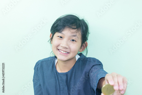 cute Thai girl happily with  Cryptocurrency 