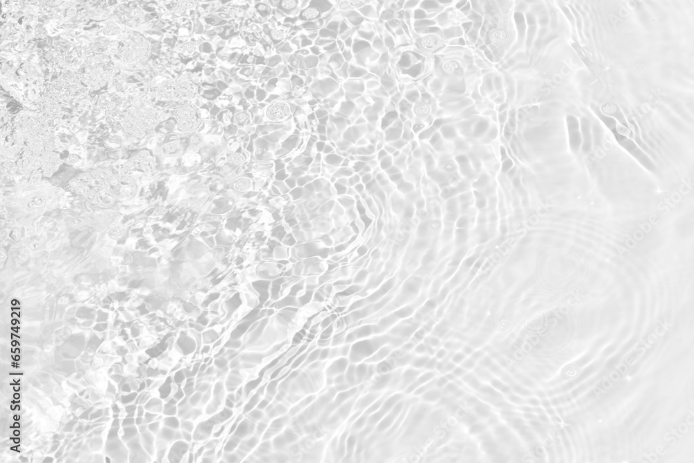 Defocus blurred transparent white colored clear calm water surface texture with splashes reflection. Trendy abstract nature background. Water waves in sunlight with copy space. Blue watercolor shine. Defocus blurred transparent white colored clear calm water surface texture with splashes reflection. Trendy abstract nature background. Water waves in sunlight with copy space. Blue watercolor shine.