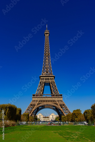 Fototapeta Naklejka Na Ścianę i Meble -  Eiffel Tower with Champs de Mars and sunny blue sky in Paris, France