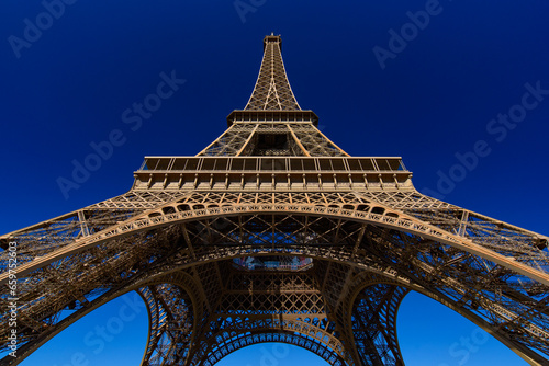 Eiffel Tower with sunny blue sky in Paris  France