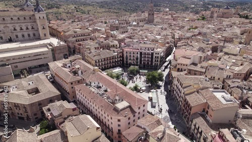 Aerial: Toledo's Plaza de Zocodover with historic buildings and lively crowd photo