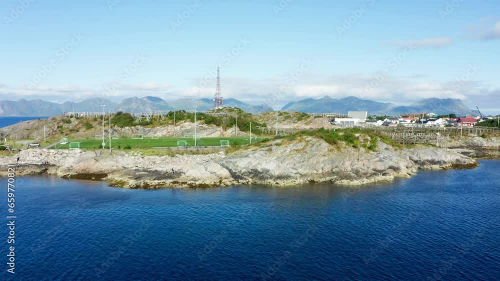 Calm Blue Waters Surrounding A Football Field Calm Blue Waters Surrounding A Football Field