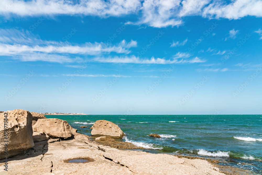 Rocky sea shore with beautiful turquoise water