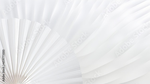 An elegant and minimalist image of a white paper fan on a light gray background. The fan is composed of thin  curved lines that create a sense of depth and dimension.