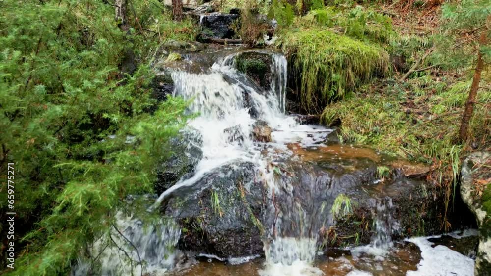 Small stream of fresh water that goes down the mountainside, Guadarrama, Madrid. Small stream of fresh water that goes down the mountainside, Guadarrama, Madrid.