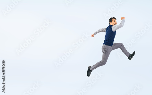ジャンプするミドル男性（切り抜き背景透過PNGも販売しております。作成者リンクから「PNG」で検索してください）