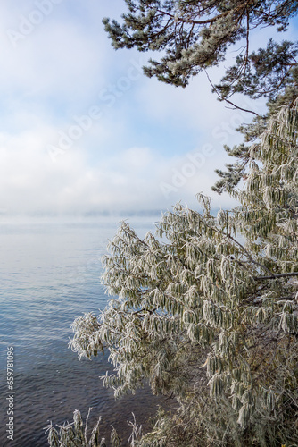 The first frosts and silence of an autumn morning on the Irkutsk reservoir on the eve of winter.