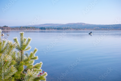 The first frosts and silence of an autumn morning on the Irkutsk reservoir on the eve of winter. photo