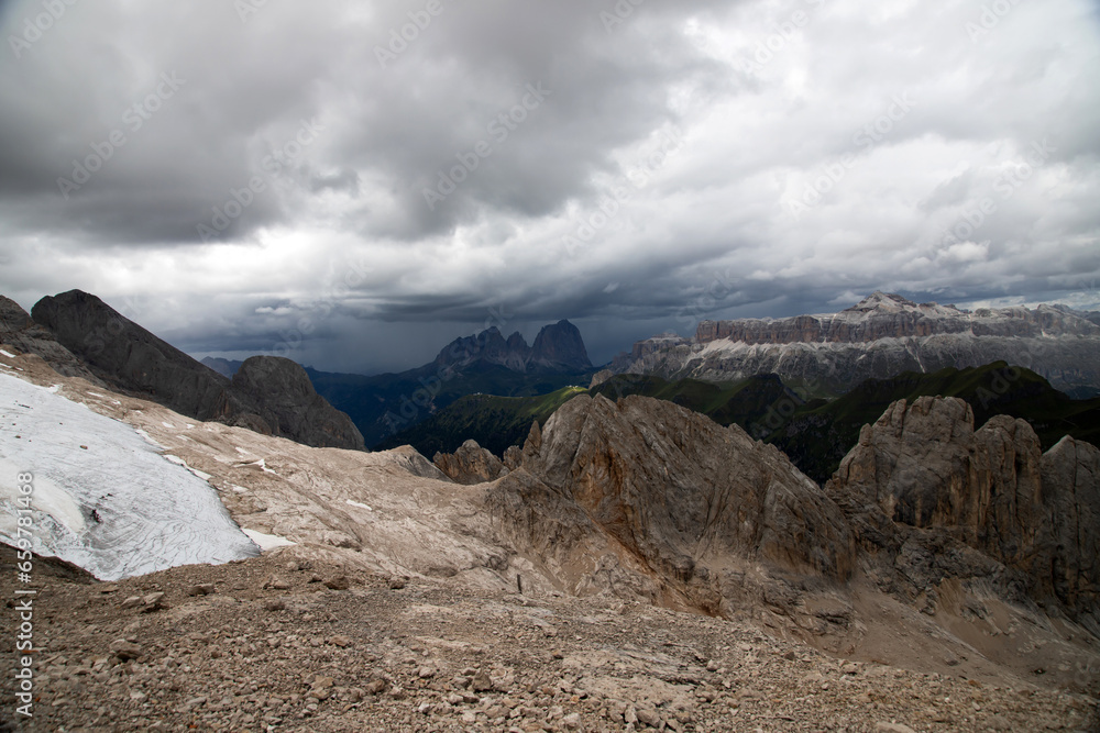 The three peaks of the Sassolungo (Langkofel) befor summer storm in the Dolomites, Italy. The three peaks of the Sassolungo (Langkofel) befor summer storm in the Dolomites, Italy.