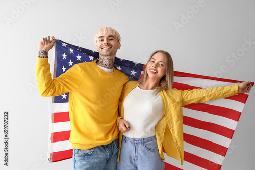 Young couple with USA flag ...