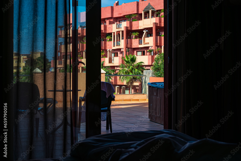 View from a hotel room to the jacuzzi on the terrace. relaxation on vacation. Photography taken in Benalmadena, Malaga, Spain.
