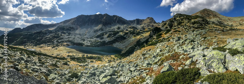 Panoramic view of Bucura lake in National Park Retezat, Romania. This is the glacial lake with the largest surface in Romania.