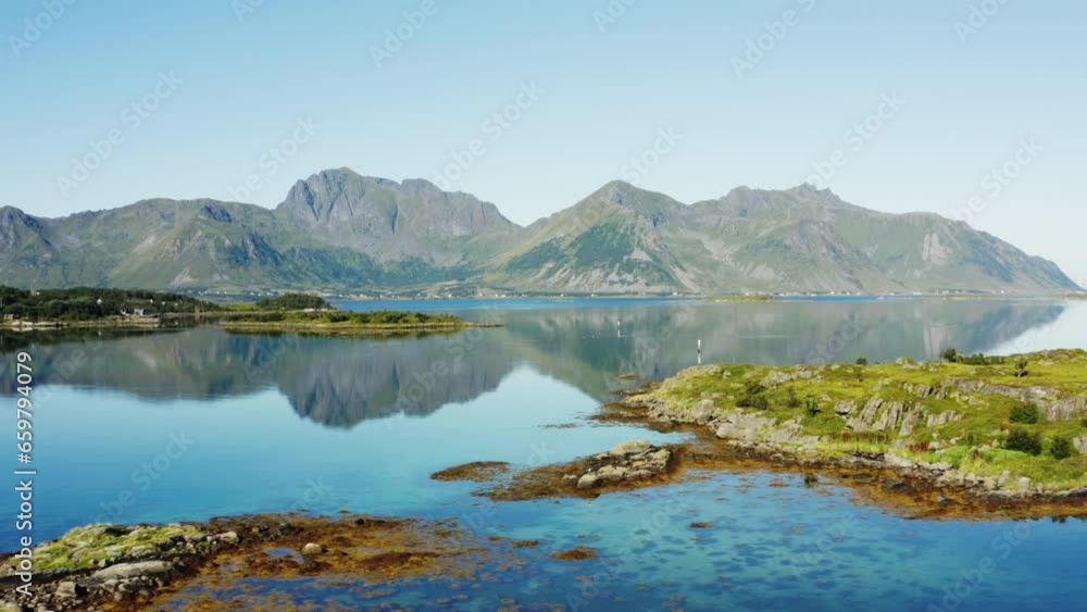 Mountain Range Reflecting On The Lake's Surface Mountain Range Reflecting On The Lake's Surface