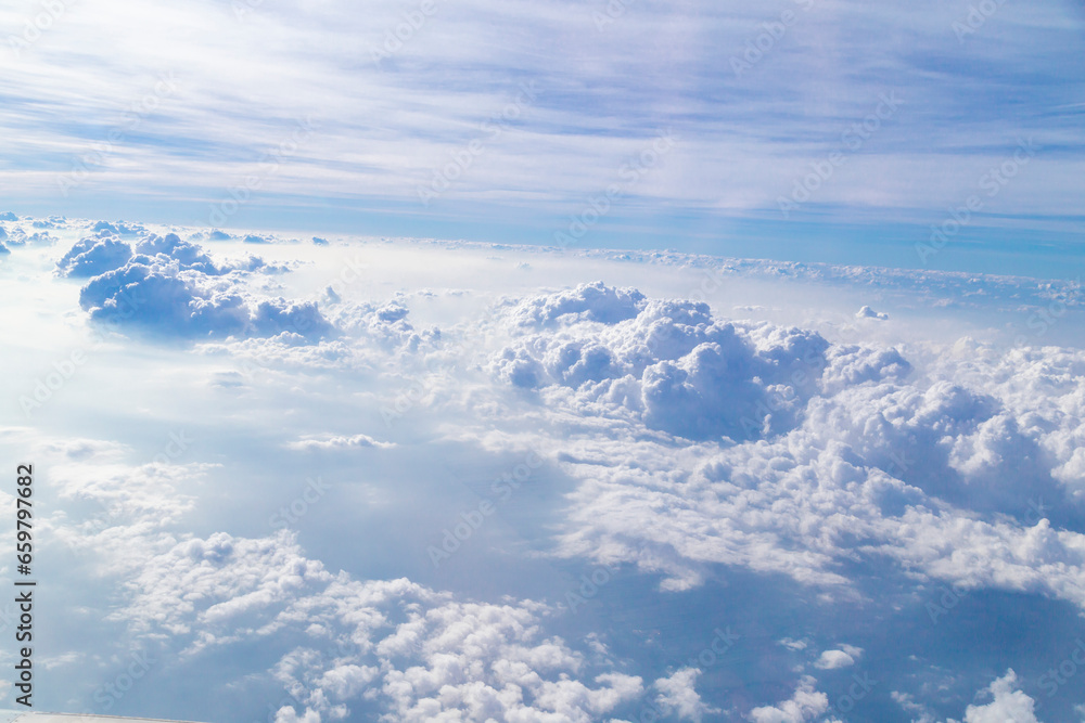 The Cloud and blue sky from the airplane windows