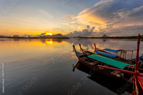Fototapeta Naklejka Na Ścianę i Meble -  Ban Sam Chong Tai and colorful sunrises that emerges behind the giant limestone mountains, Thailand