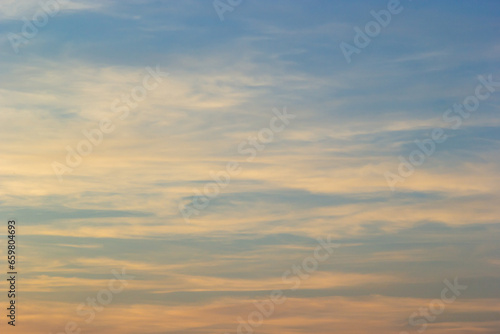 sunset sky with multicolor clouds. Dramatic twilight sky background © Oleh Marchak