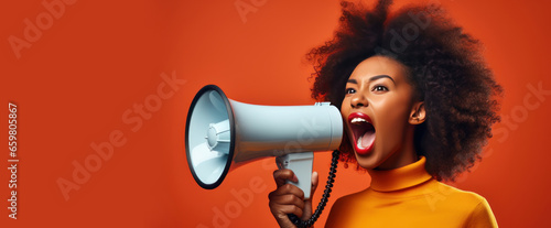 Black woman on a solid orange background shouts into a bullhorn and announces the start of Black Friday Sale Day. Banner