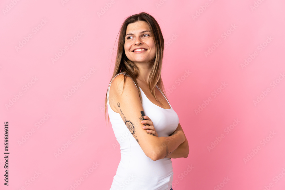 Young slovak woman isolated on pink background with arms crossed and happy Young slovak woman isolated on pink background with arms crossed and happy