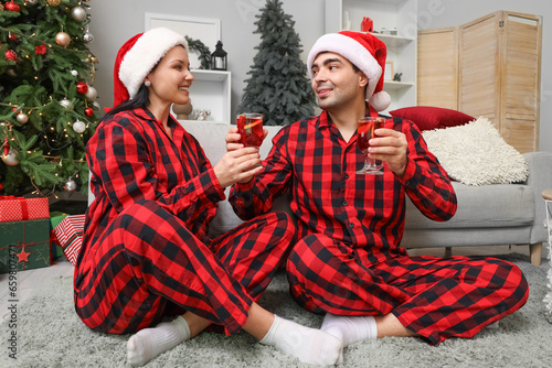 Young couple with glasses o...