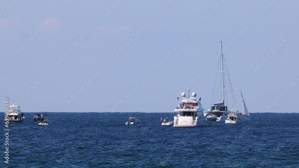 Many boats at the sea offshore during the Gold Coast Pacific Airshow event. Many boats at the sea offshore during the Gold Coast Pacific Airshow event.