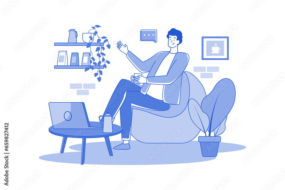 The guy sits at a laptop in a cafe The guy sits at a laptop in a cafe
