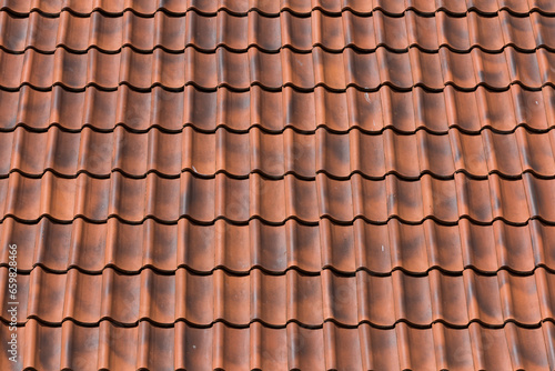 Red tiles roof background