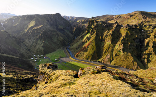 Top view of Thakgil campsite at sunset (Þakgil Camping Ground) located in a beautiful valley, surrounded by mountains, 20 km from Vík, Iceland.