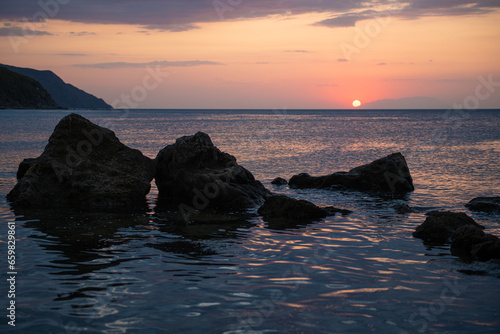 Sunset by the sea. Sunset long exposure. Sunset from the beach. Sea cliffs and sunset. Galippoli  Canakkale  T  rkiye.