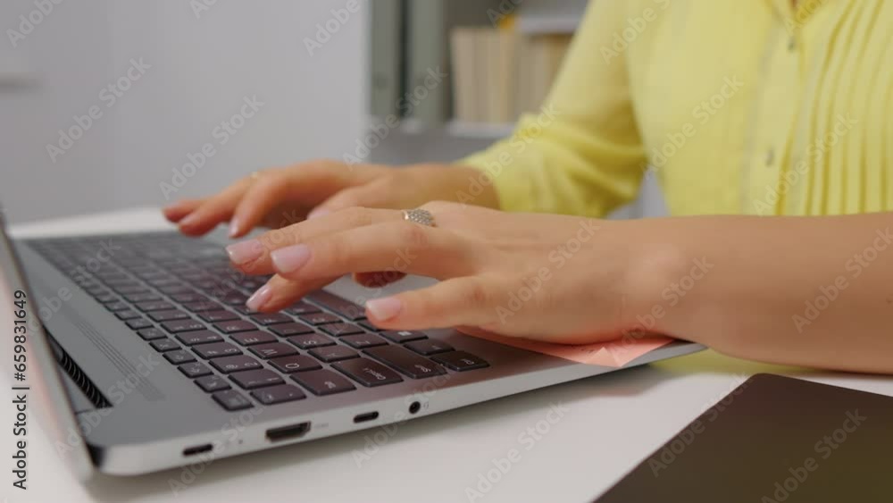 Woman typing on keyboard then opening the clipboard and raising a pile of money. Accountant taking money out of a clipboard. Woman typing on keyboard then opening the clipboard and raising a pile of money. Accountant taking money out of a clipboard.