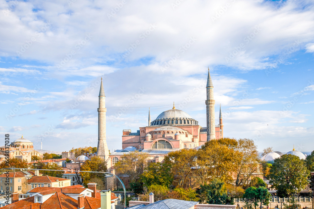 Fototapeta premium Ayasofya Museum, Hagia Sophia in Sultan Ahmet park in Istanbul, Turkey in a beautiful autumn day. Byzantine architecture, city landmark and architectural world wonder