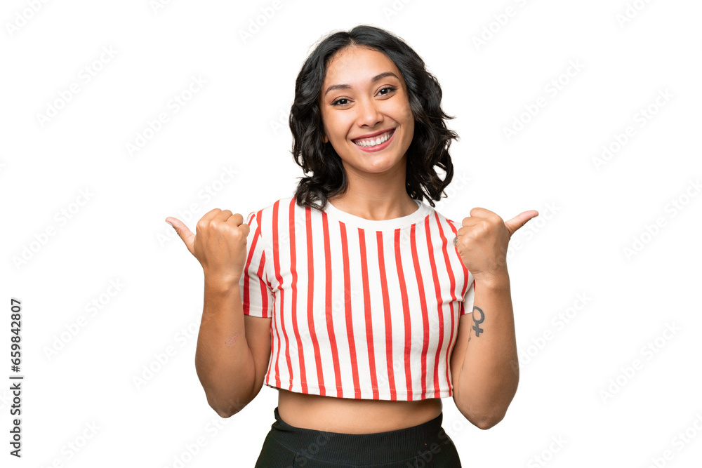 Young Argentinian woman over isolated background with thumbs up gesture and smiling - obrazy, fototapety, plakaty 