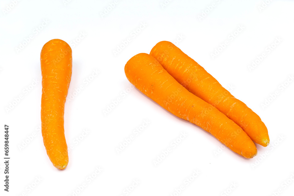Closeup of carrots on white background Closeup of carrots on white background