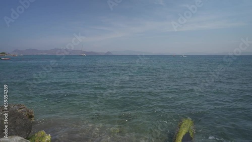 Sea and people on Lambi Beach, Kos Town, Kos, Dodecanese, Greek Islands photo