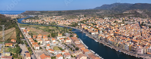 Panoramic drone point of view of the Italian town of Bosa and the Temo River that runs to Bosa Marina, a tourist destination on the island of Sardinia © Gustavo Muñoz