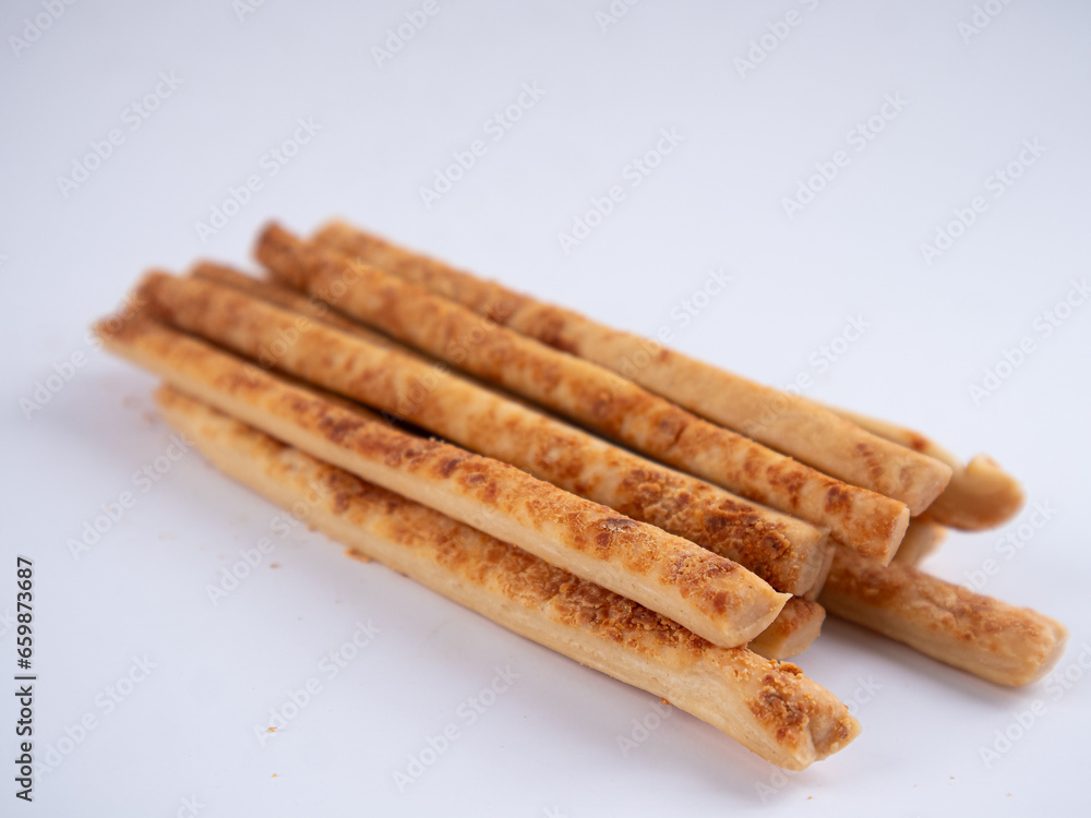 Cheese Sprinkle Stick Cookies are neatly presented and isolated against a white background. Cheese Sprinkle Stick Cookies are neatly presented and isolated against a white background.