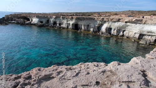 Emerald transparent sea and caves in the Blue Lagoon in Ayia Napa on the island of Cyprus
