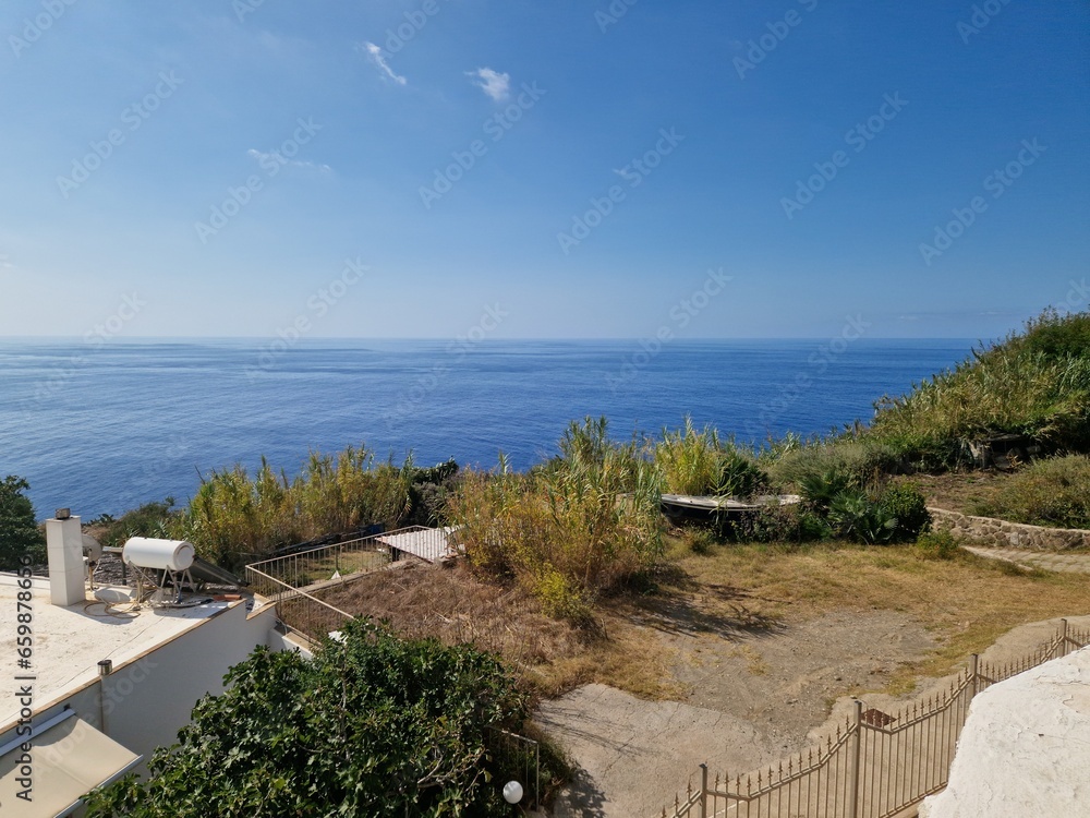 Obraz premium The beautiful Ventotene Island: Colorful Houses, Boats, and a Wonderful Sea. Popular island in the mediterranean near to Formia, Ponza and Ischia in Italy