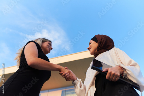 Bilde på lerret In a real-life scene, a Muslim woman in a hijab, who is a real estate business o