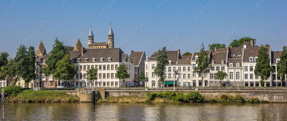 Panorama of historic houses at the Maas river bank in Maastricht, Netherlands