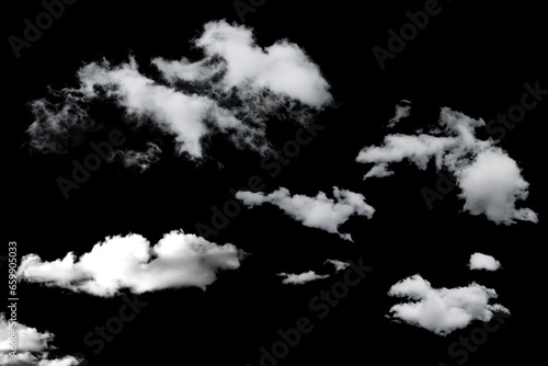 white fluffy clouds standing out against a black background