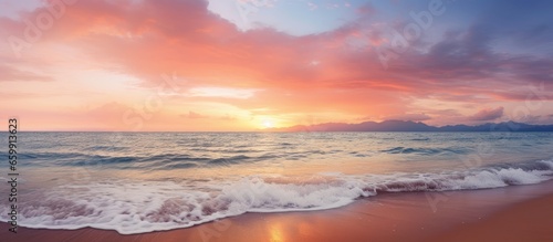 Tropical sea and sky with clouds during beach sunrise or sunset With copyspace for text © 2rogan