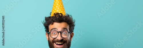 An individual wearing a festive hat, signaling their birthday