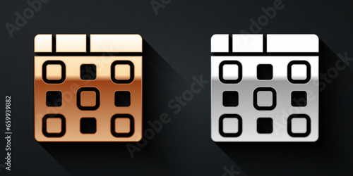 Gold and silver Drum machine music producer equipment icon isolated on black background. Long shadow style. Vector