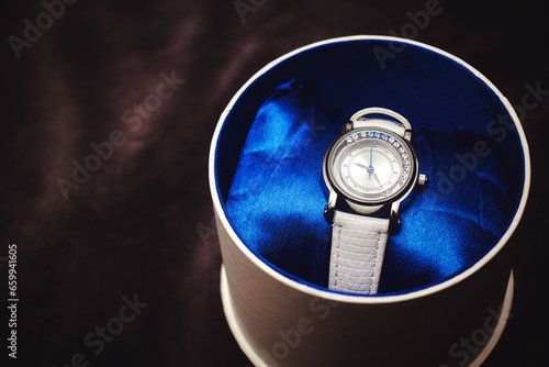 Women's watches in a gift box. Stock photo of women's watches