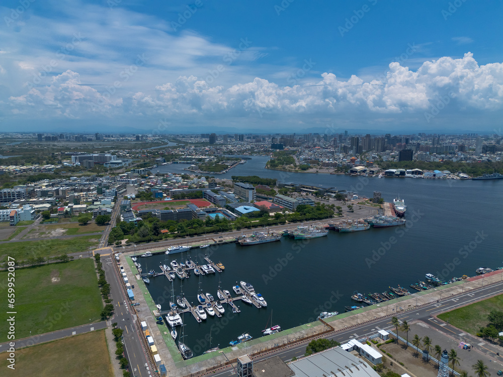 Naklejka premium Aerial drone photo of Tainan City by drone in Taiwan. A bustling city, transportation shot from above. Aerial shot and photo background.