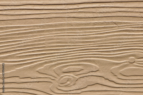 Close-up shot of the fake wood panel surface.