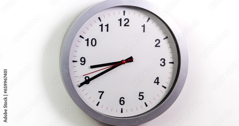 Clock face time lapse on white background with copy space for your own text. Clock time ticking on a classic Wall Clock. Shadows moving over the Watch. Half of a Clock dial close-up isolated. Concept Clock face time lapse on white background with copy space for your own text. Clock time ticking on a classic Wall Clock. Shadows moving over the Watch. Half of a Clock dial close-up isolated. Concept