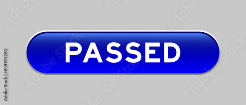 Blue color capsule shape button with word passed on gray background