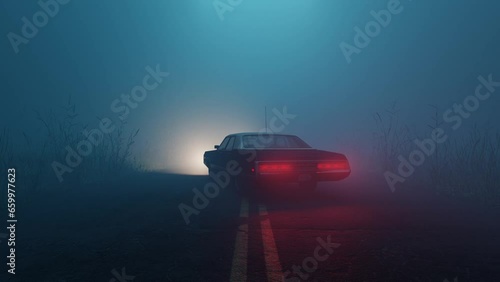 Car parked in middle of road in foggy moody forest during blue hour