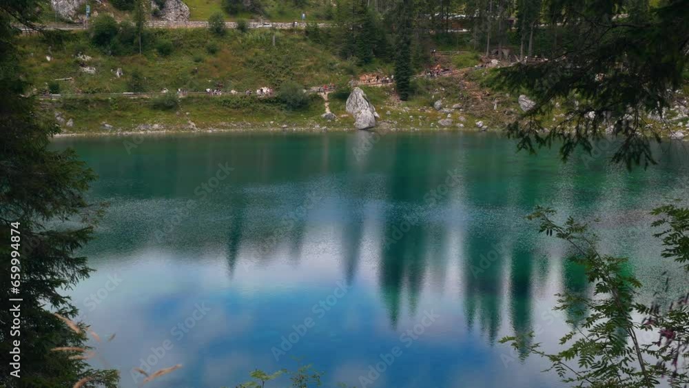 Alpine lake of Carezza in Val d'Ega - Bolzano - south tyrol Alpine lake of Carezza in Val d'Ega - Bolzano - south tyrol